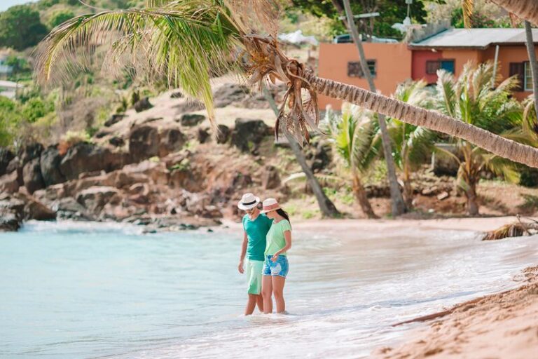 Honeymoon couple walking on beach
